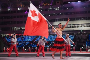 PYEONGCHANG-GUN, SOUTH KOREA - FEBRUARY 09:  Flag bearer Pita Taufatofua of Tonga leads his country during the Opening Ceremony of the PyeongChang 2018 Winter Olympic Games at PyeongChang Olympic Stadium on February 9, 2018 in Pyeongchang-gun, South Korea.  (Photo by Quinn Rooney/Getty Images)