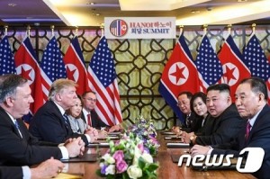 US President Donald Trump (2nd L) and North Korea's leader Kim Jong Un (2nd R) hold a bilateral meeting during the second US-North Korea summit at the Sofitel Legend Metropole hotel in Hanoi on February 28, 2019. (Photo by Saul LOEB / AFP)